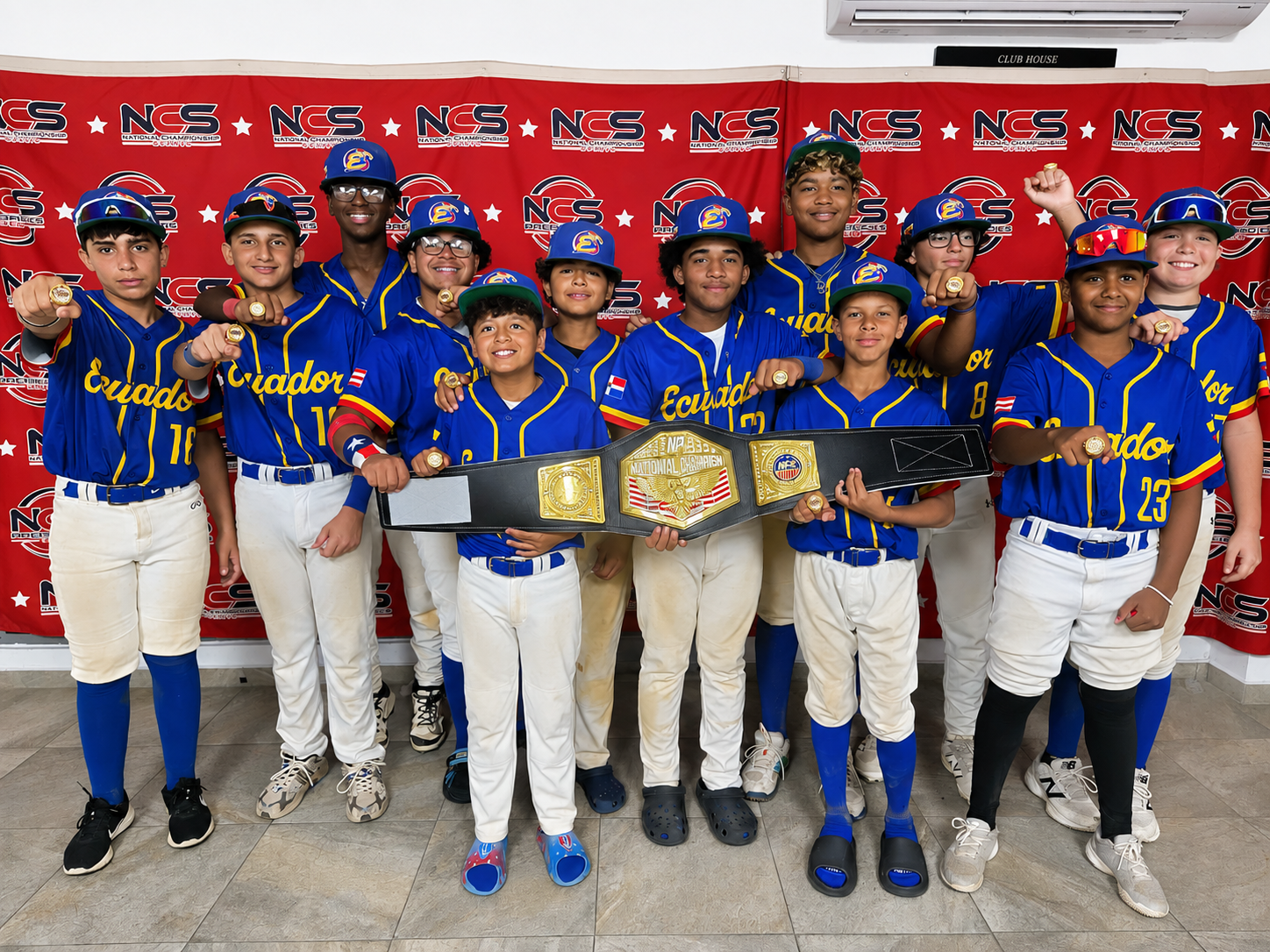 Bronx Mambas IPL International Champions holding the championship belt
